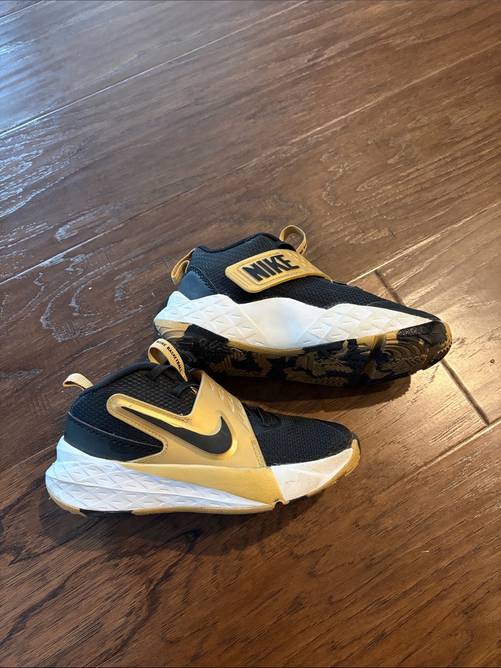 Nike Kids Black and Gold Slip-On Athletic Sneakers